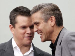 Actors Matt Damon (L) and George Clooney