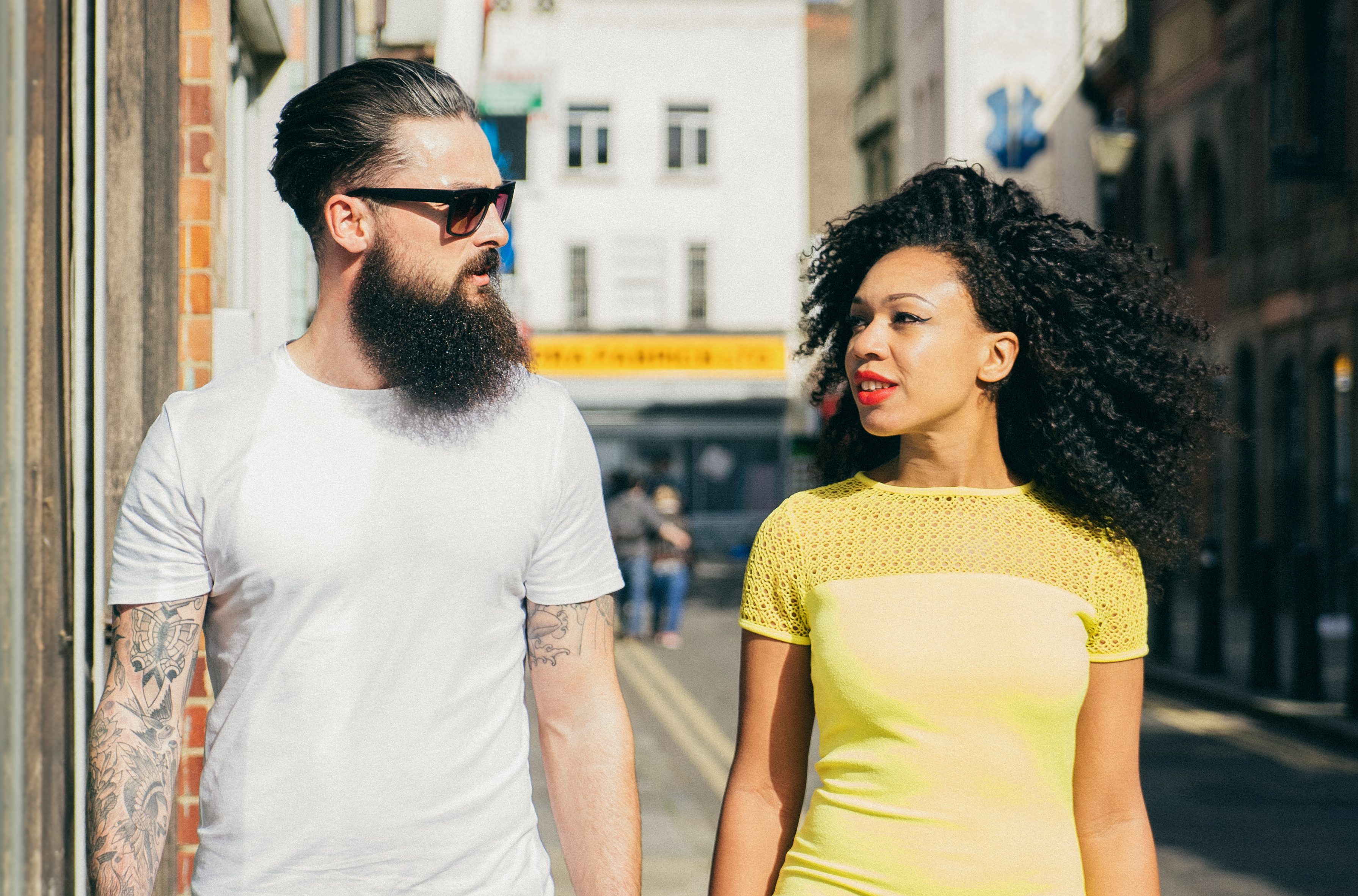 Couple Walking Through The City