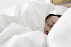 Women asleep in bed