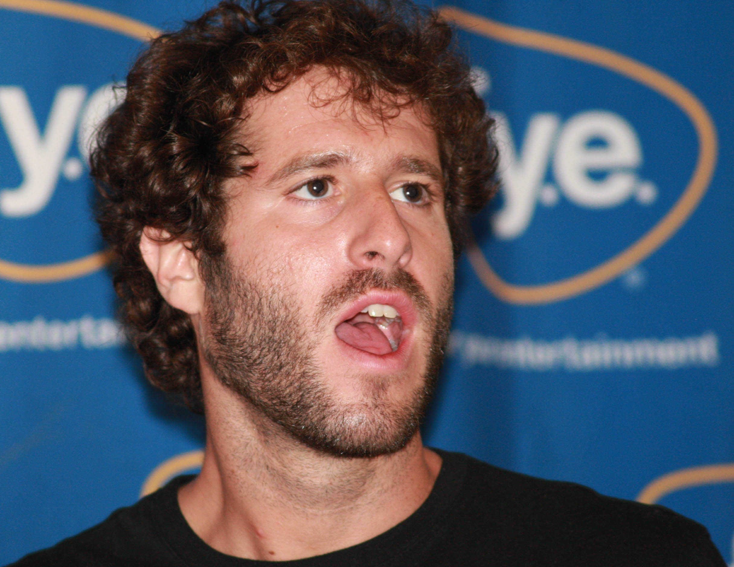 Lil Dicky signs copies of his new album 'Professional Rapper'