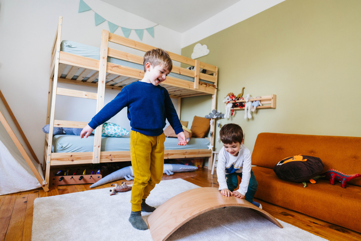 Two little boys playing in their room